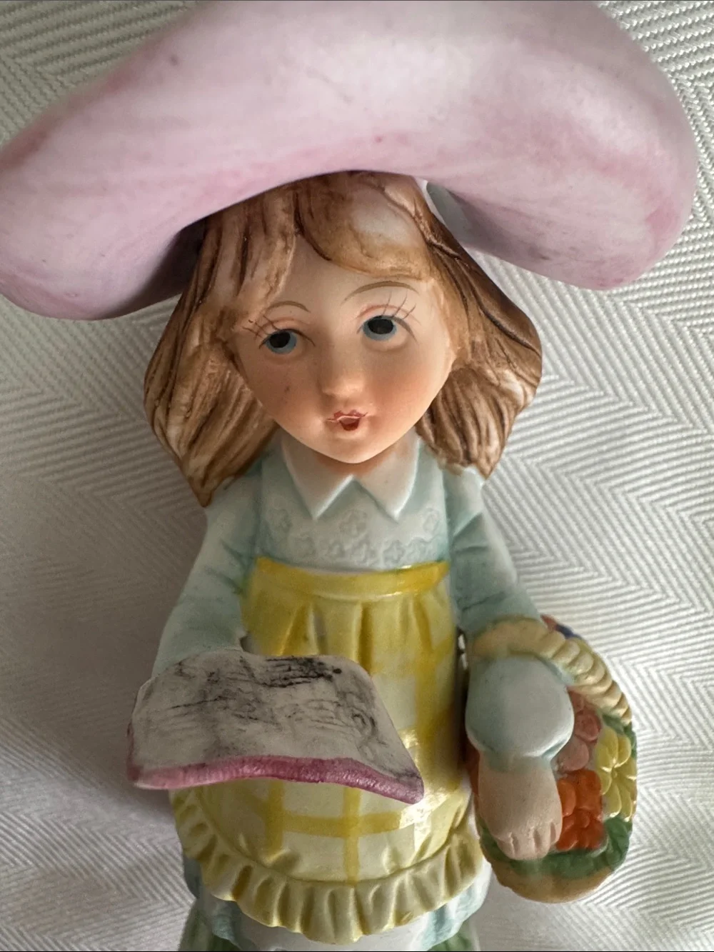 Hand-Painted Girl Figurine in Pink Hat and Yellow Apron - Unbranded